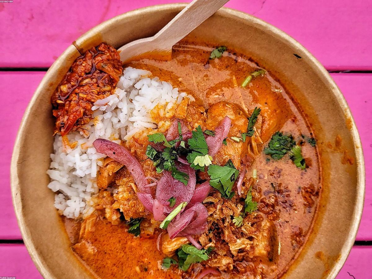 Chicken biryani in a serving bowl